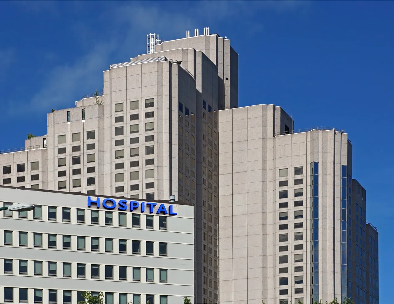 Hospital building against blue sky